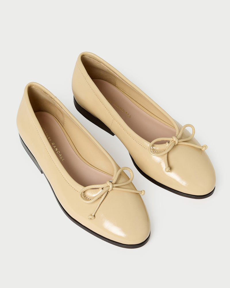 Noelle Bisque Ballet Flat in patent leather.
