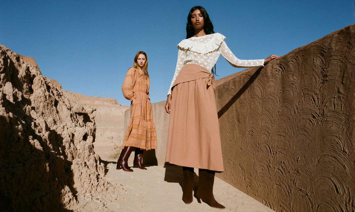 Perrin Dress in light brown, Goldy Espresso Leather Tall Boot, Abigail Top in cream crocheted cotton, Peyton Skirt in light brown cotton, and Cleo Brown Suede Mid-Calf Boot - Loeffler Randall