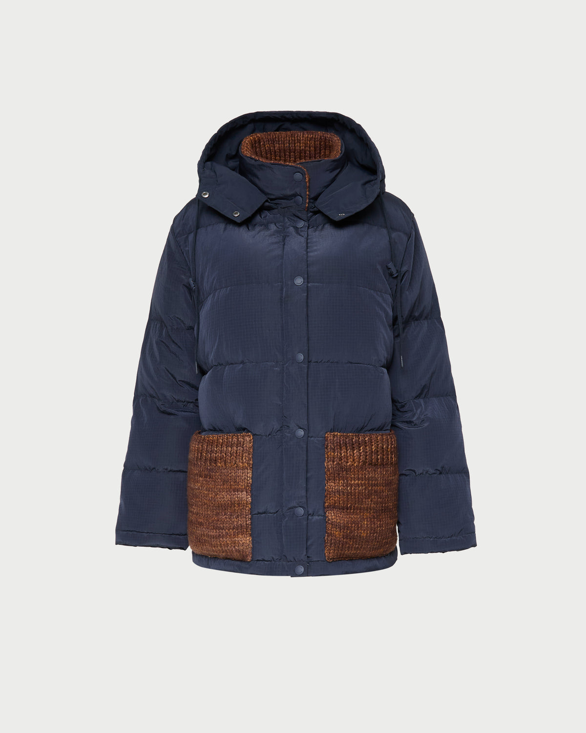 Pippa Puffer Coat in navy nylon and brown wool.