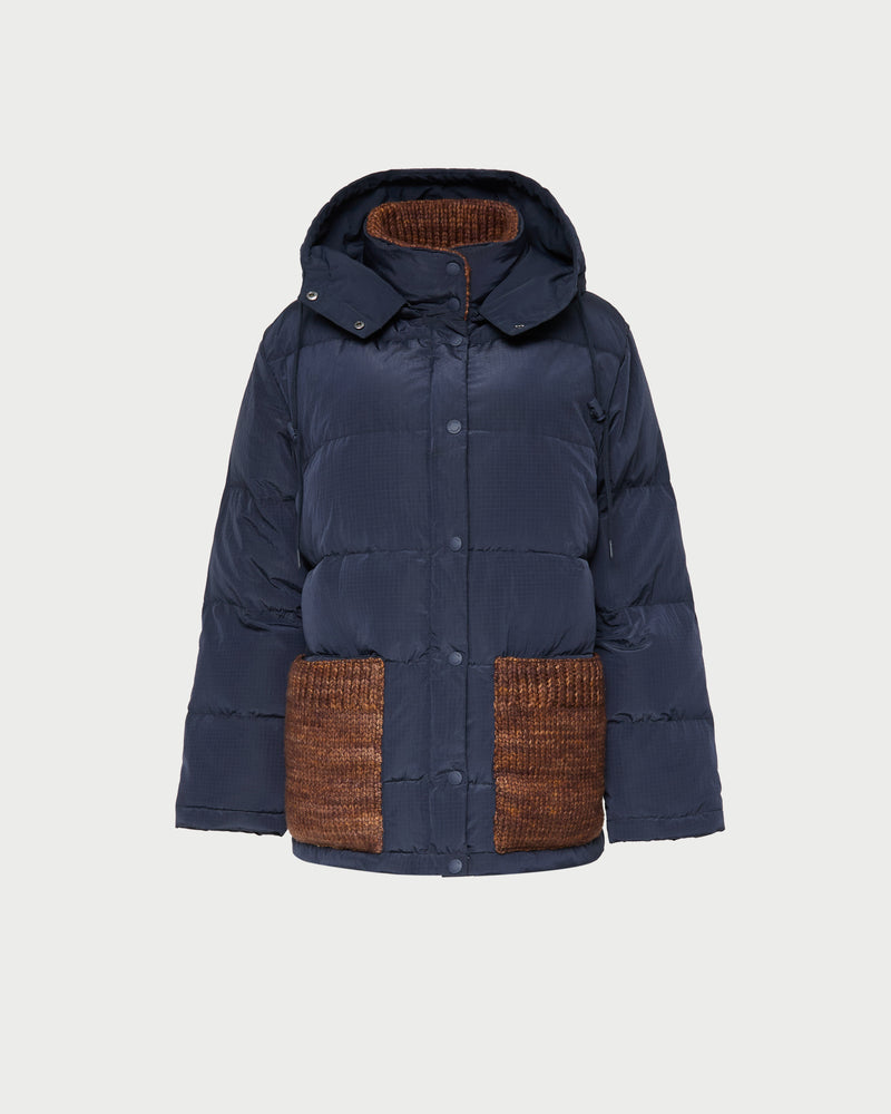 Pippa Puffer Coat in navy nylon and brown wool.