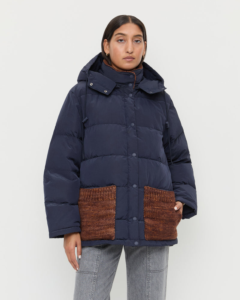 Pippa Puffer Coat in navy nylon and brown wool and Molly Workwear Jean in grey denim.