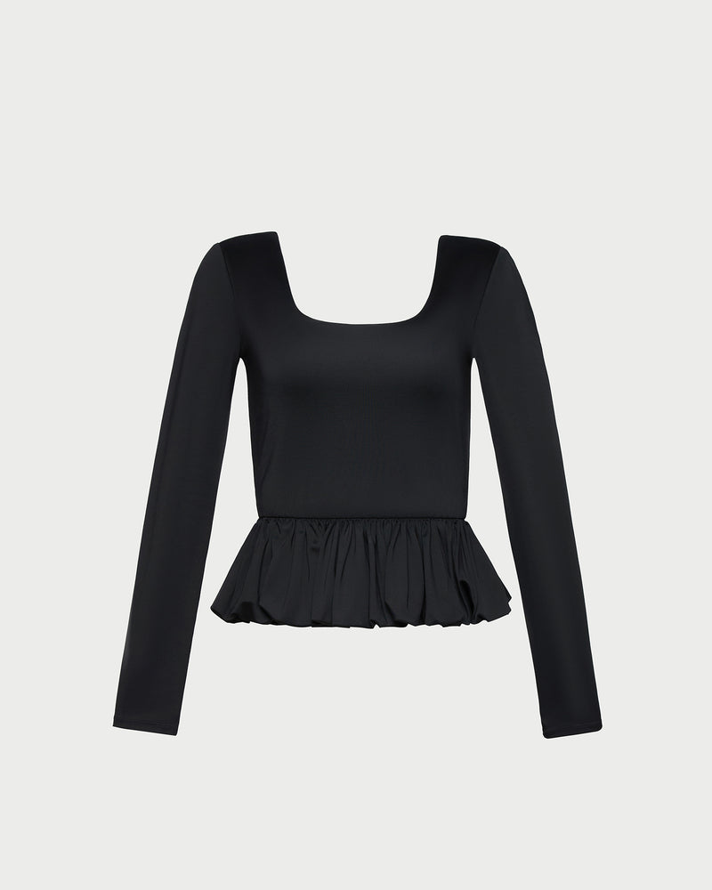 Posie Peplum Top in black jersey material.