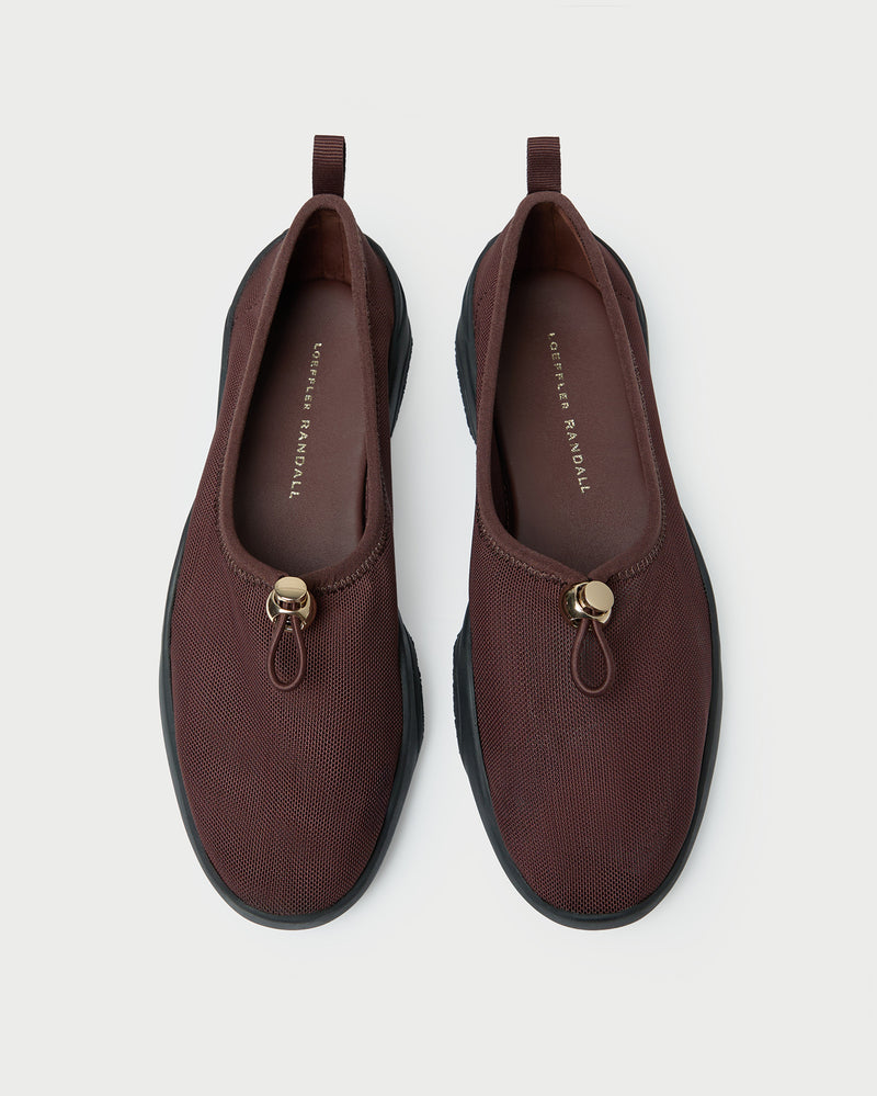 Raina Dark Brown Mesh Flat in dark brown mesh.