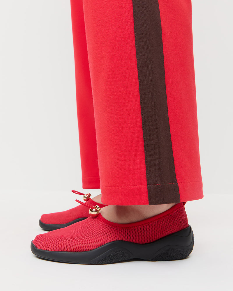 Raina Red/Black Mesh Flat in red mesh with black sole and Spencer Sweatpant in red and brown jersey.