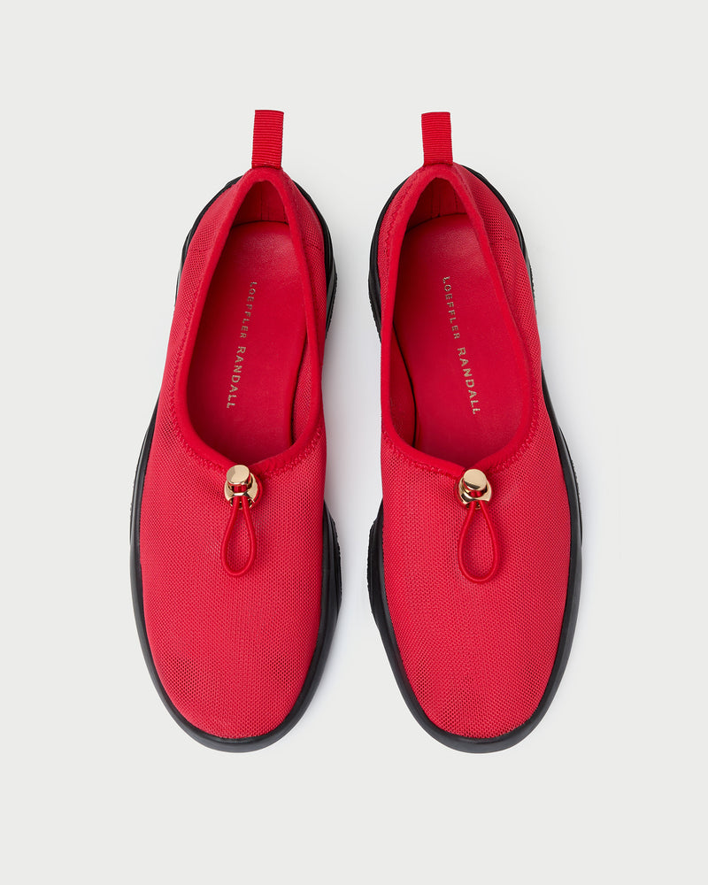 Raina Red/Black Mesh Flat in red mesh with black sole.