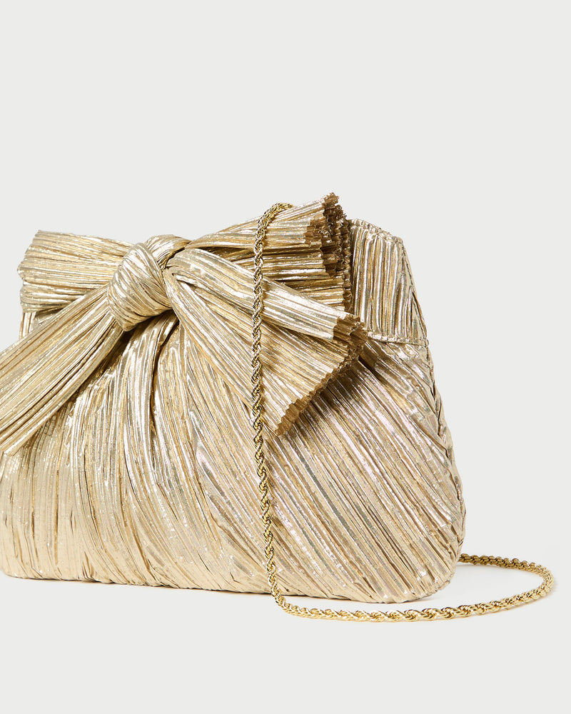 Rayne Gold Bow Clutch in pleated gold fabric.