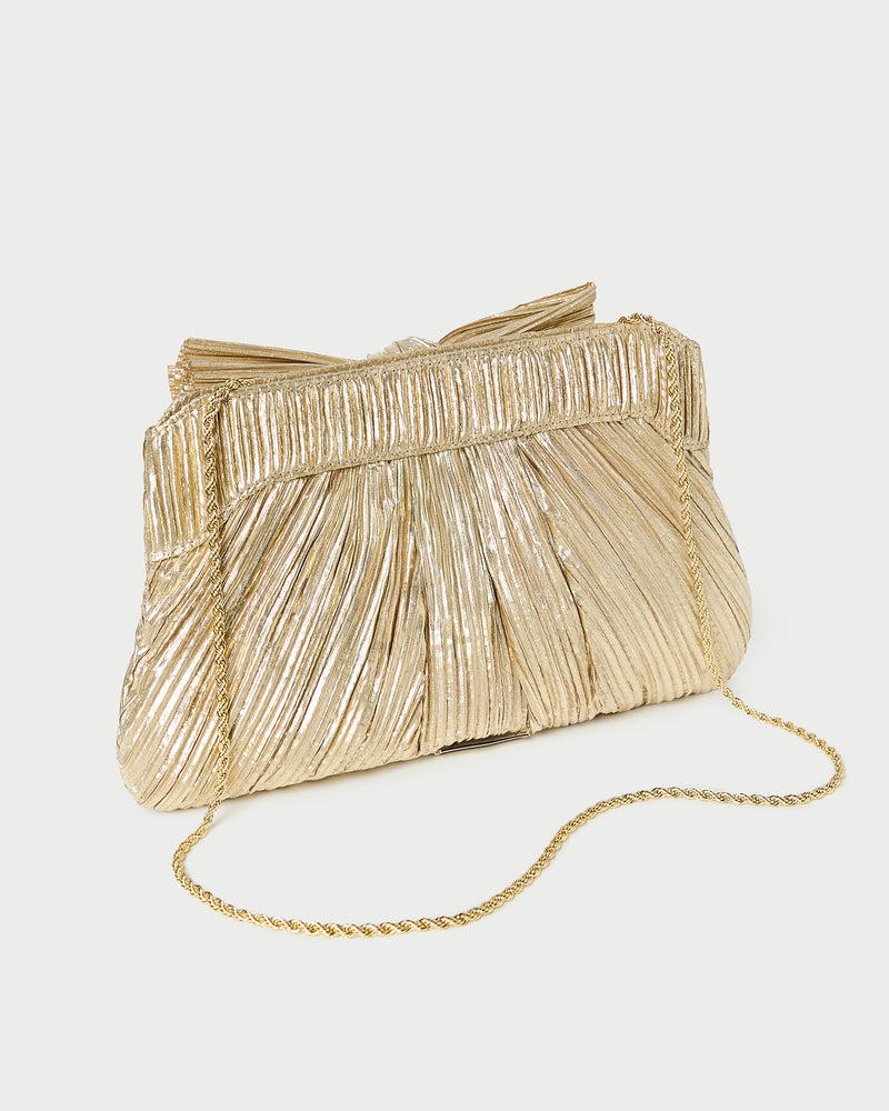 Rayne Gold Bow Clutch in pleated gold fabric.