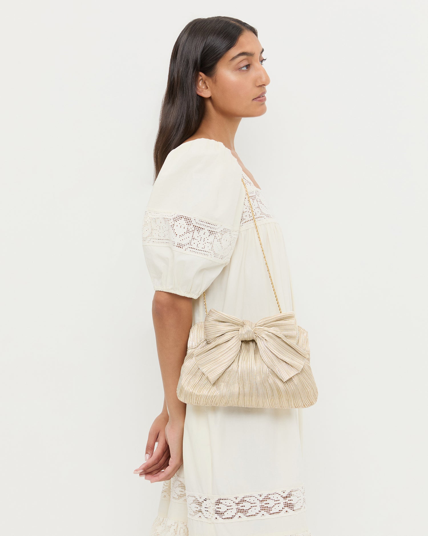 Rayne Platinum Bow Clutch | Clutches | Handbags