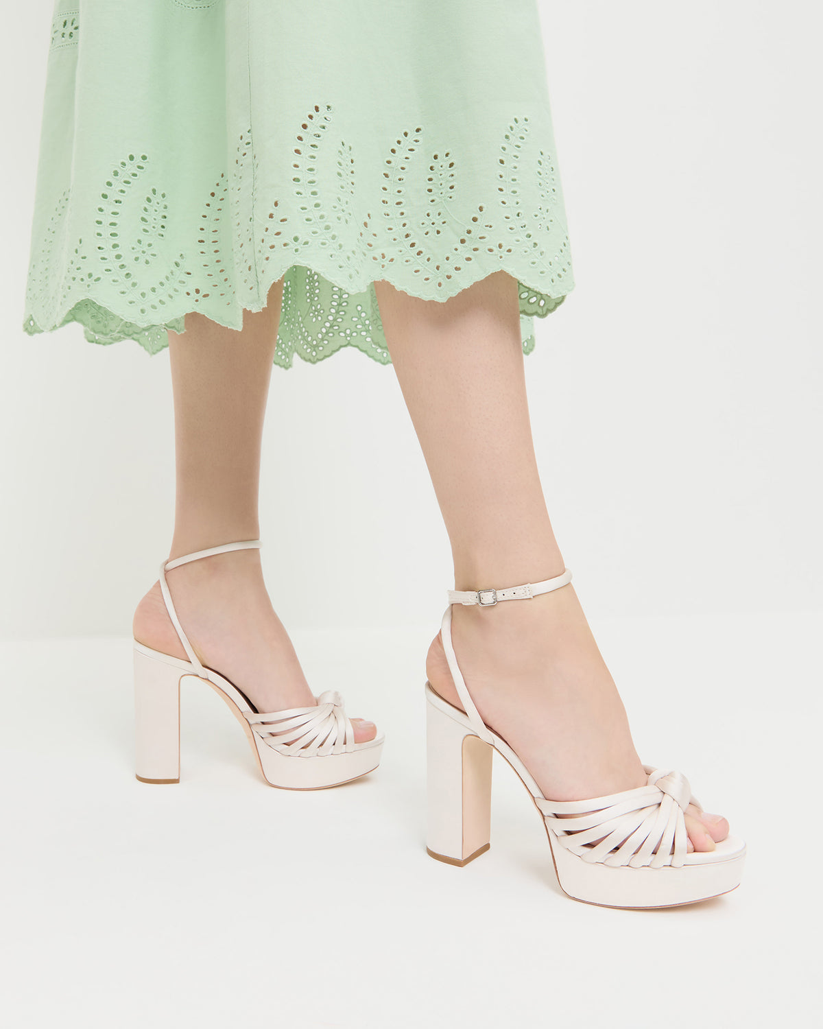 Rivka Cream Knot Platform Sandal in cream satin and Thelma Eyelet Dress in mint green cotton.