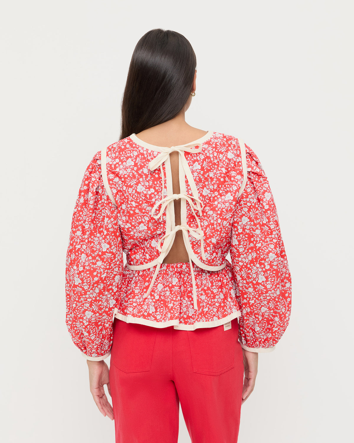 Rosa Top in red rosette floral cotton and Demi Embroidered Pant in red denim.