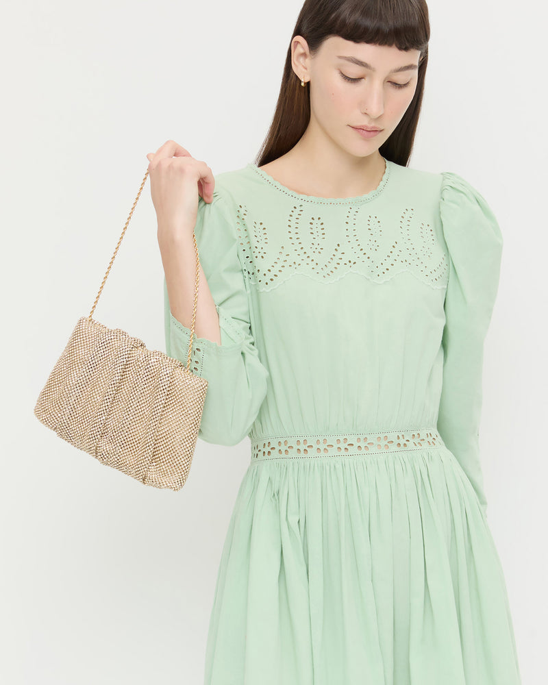 Serena Gold Diamanté Gathered Clutch in gold diamanté and Thelma Eyelet Dress in mint green cotton.