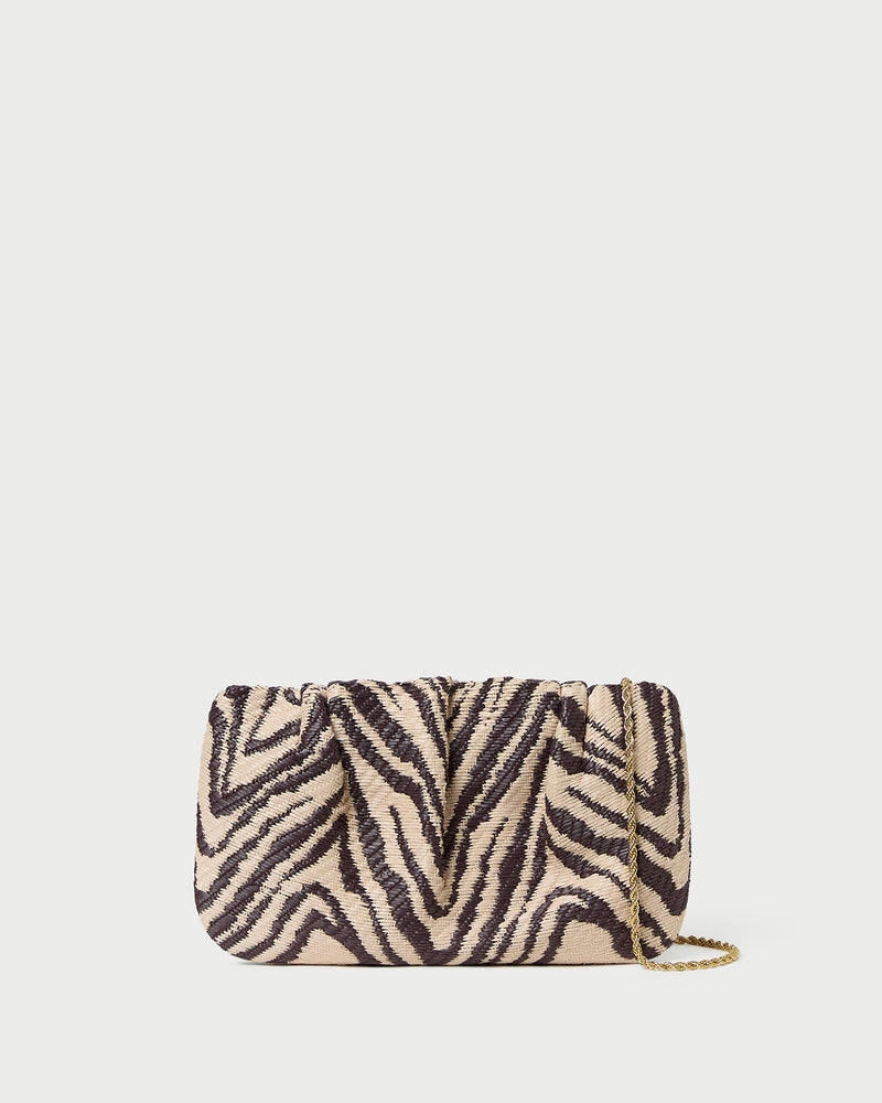 Serena Zebra Gathered Clutch in zebra print woven straw fabric.