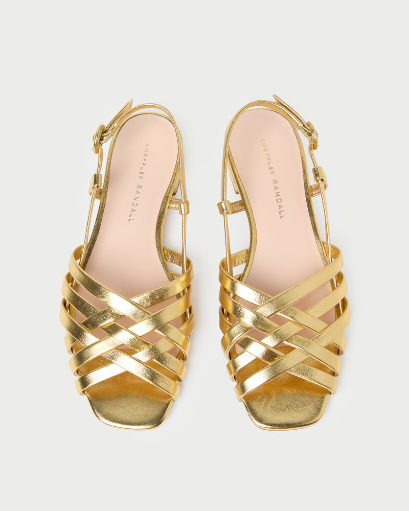 Shelly Gold Leather Flat Sandal in gold metallic leather.