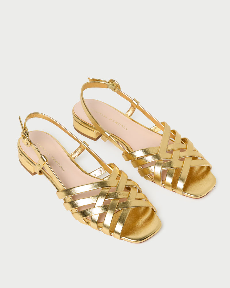 Shelly Gold Leather Flat Sandal in gold metallic leather.