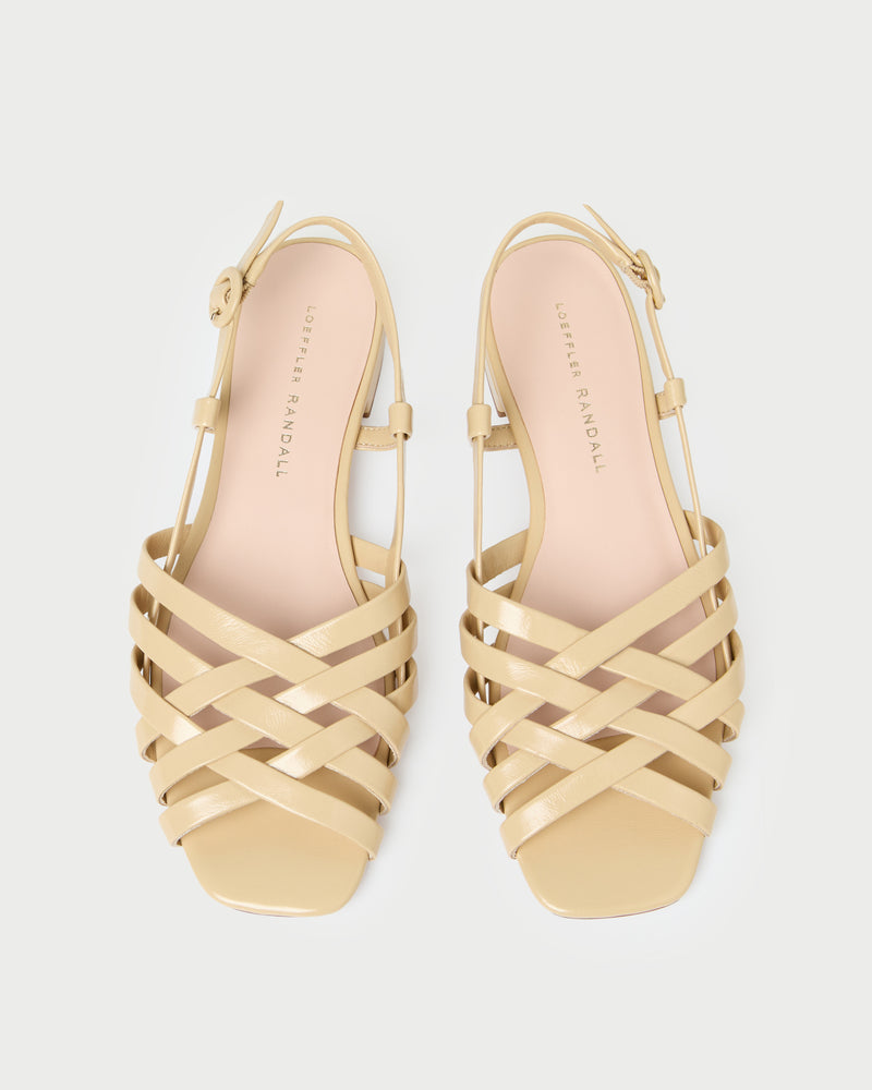 Shelly Bisque Leather Flat Sandal in bisque tan leather.