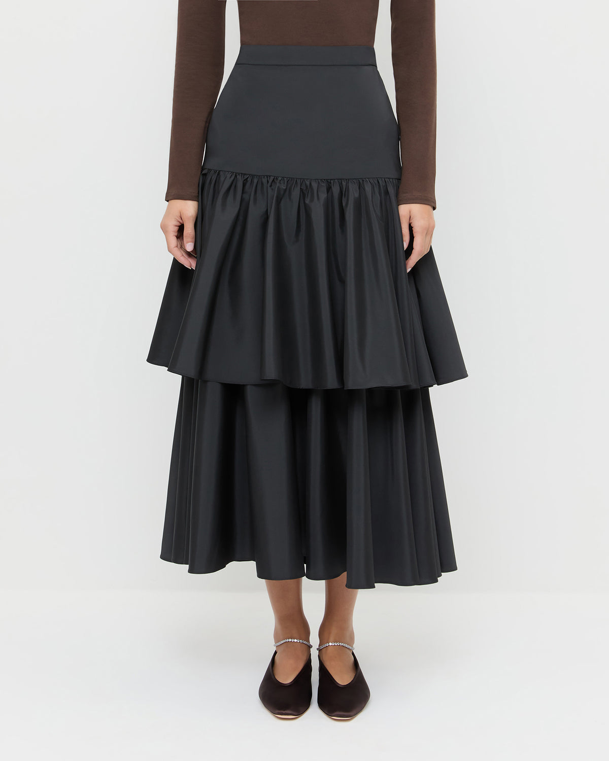 Sora Skirt in black taffeta, Lumi Long Sleeve Bodysuit in chocolate brown jersey, and Emery Black/Crystal Ballet Flat.