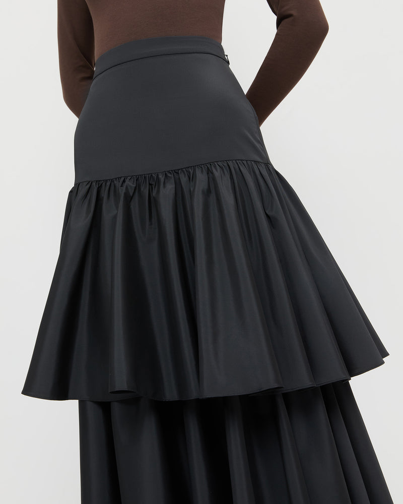 Sora Skirt in black taffeta and Lumi Long Sleeve Bodysuit in chocolate brown jersey.