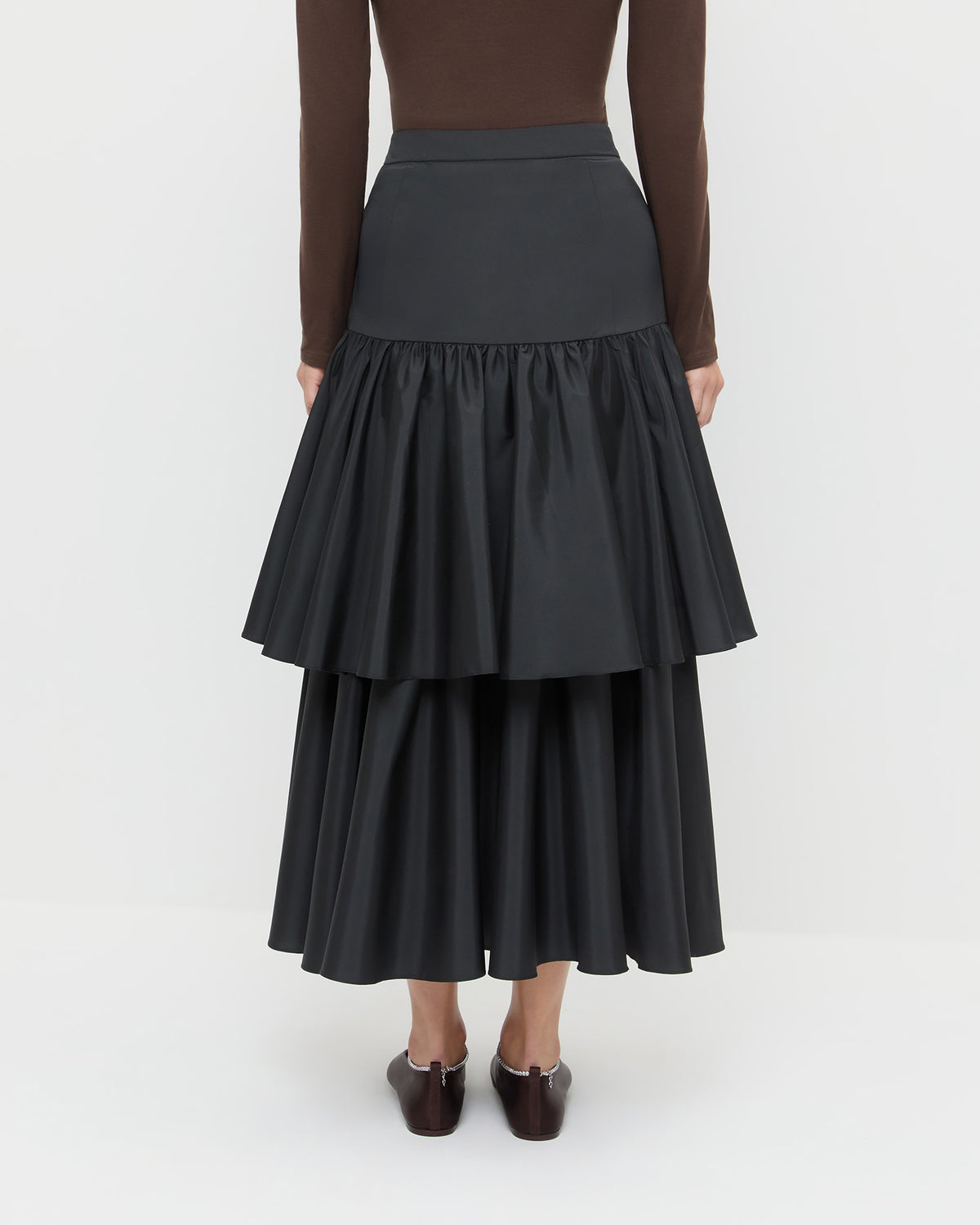 Sora Skirt in black taffeta, Lumi Long Sleeve Bodysuit in chocolate brown jersey, and Emery Black/Crystal Ballet Flat.