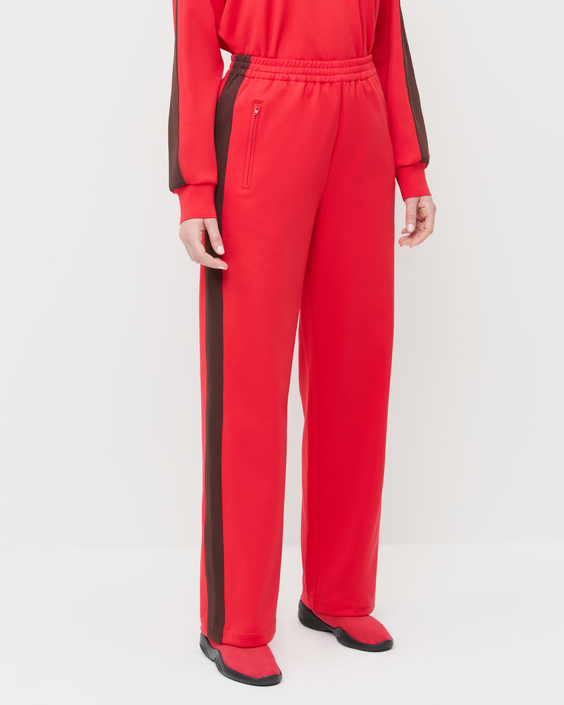 Spencer Sweatpant in red and brown jersey, Emerson Soccer Jersey in red and brown jersey, and Raina Red/Black Mesh Flat.