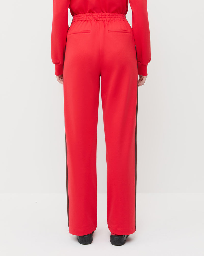 Spencer Sweatpant in red and brown jersey, Emerson Soccer Jersey in red and brown jersey, and Raina Red/Black Mesh Flat.