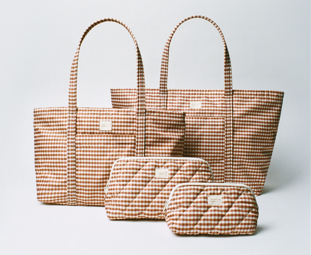 Dina Brown Gingham Travel Tote, Mira Brown Gingham Everyday Tote, Frances Brown Gingham Cosmetic Pouch, and Georgette Brown Gingham Mini Cosmetic Pouch - Loeffler Randall