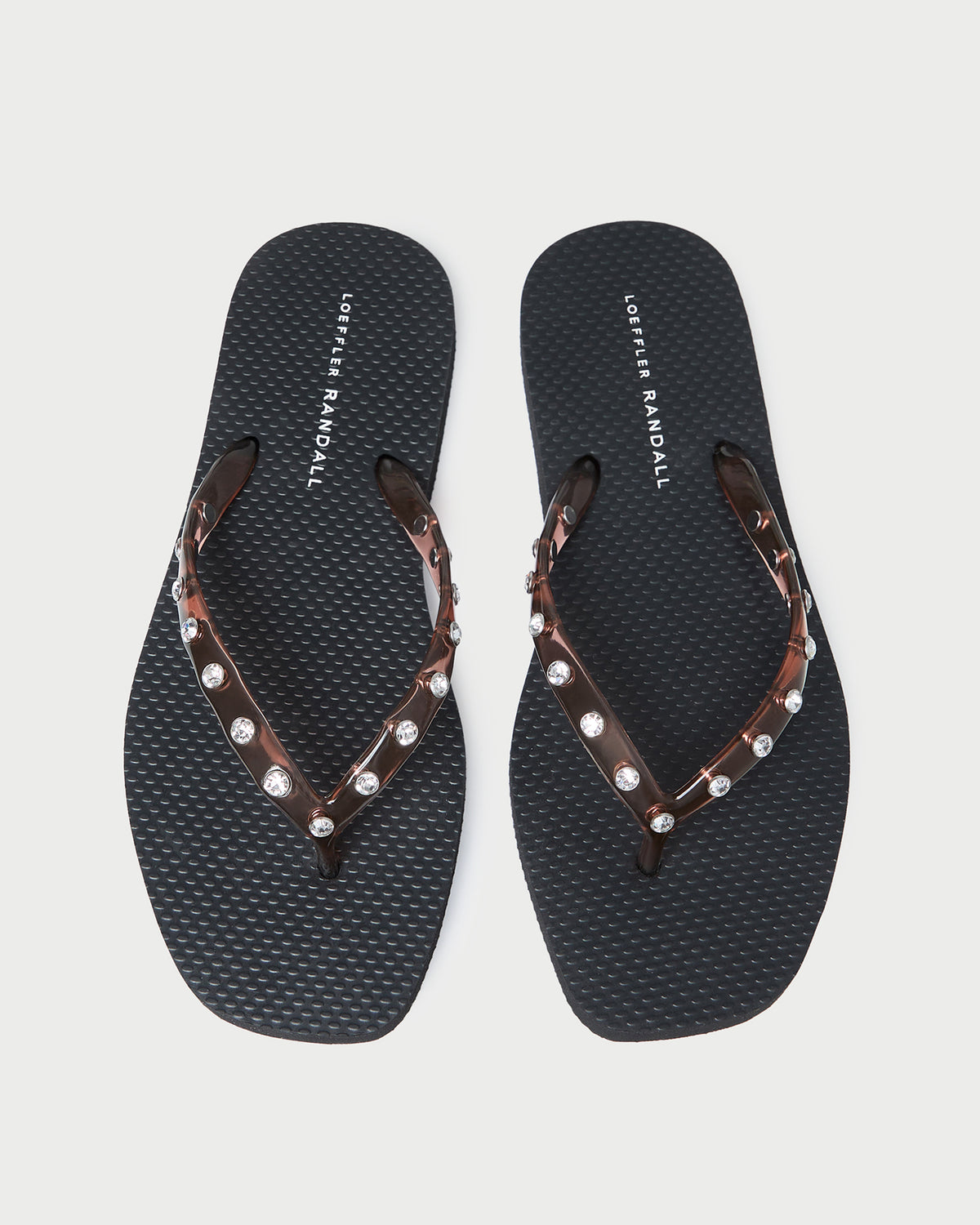 Taryn Brown Jelly Flip Flop in brown jelly and black foam.