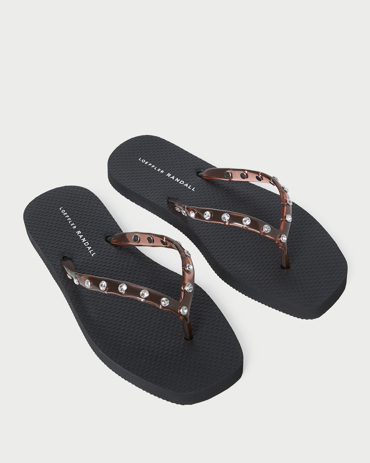 Taryn Brown Jelly Flip Flop in brown jelly and black foam.