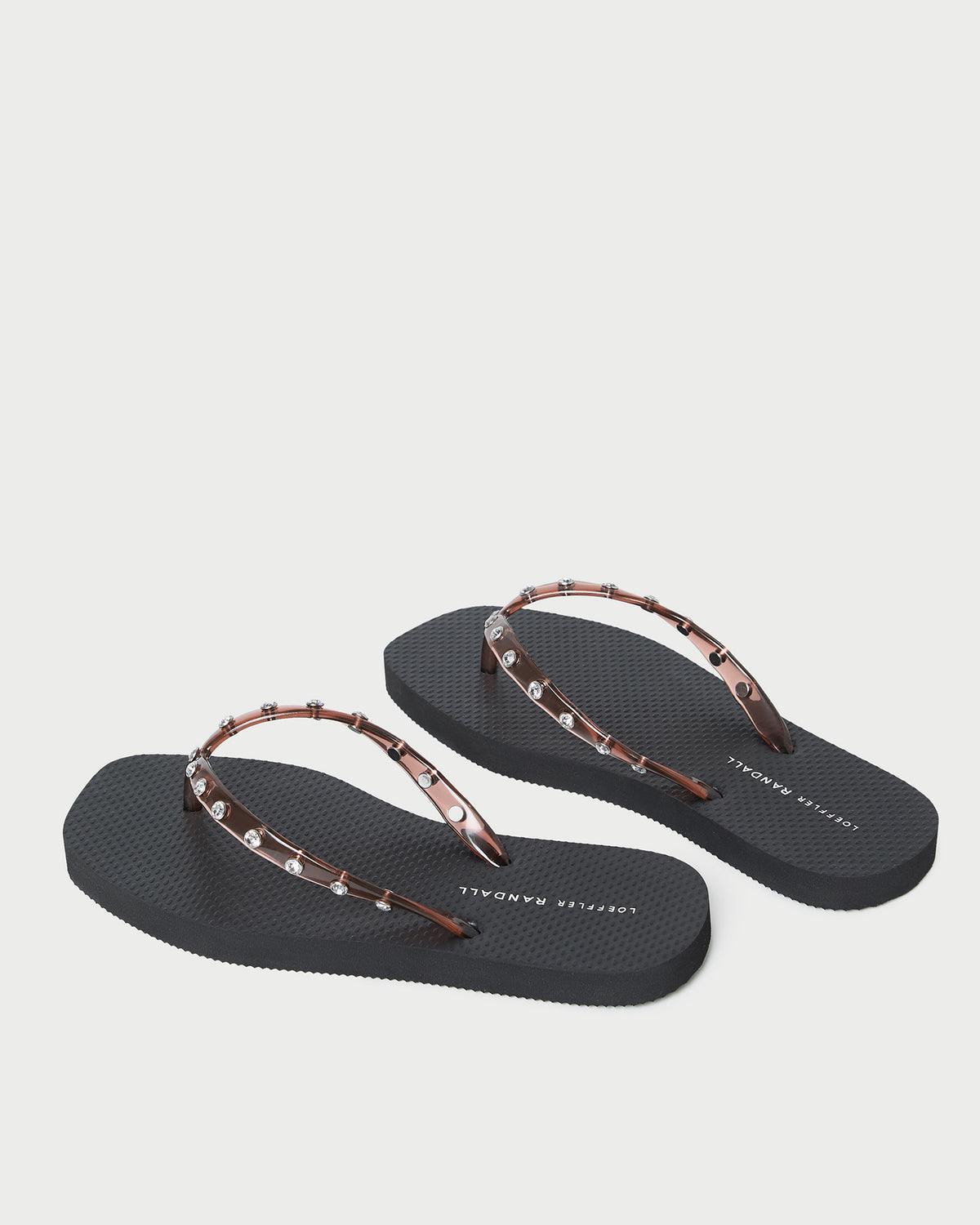 Taryn Brown Jelly Flip Flop in brown jelly and black foam.