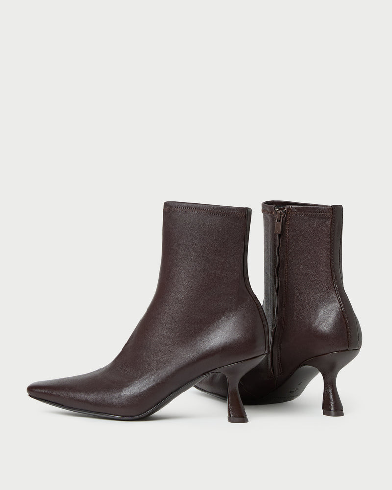 Thandy Brown Leather Curved Heel Bootie in brown leather.