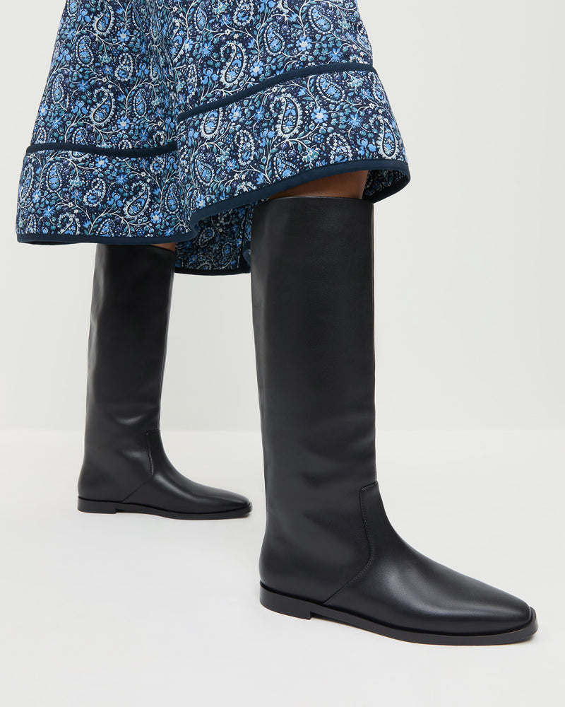 Tilly Black Leather Tall Boot in black leather and Ainsley Dress in blue floral.