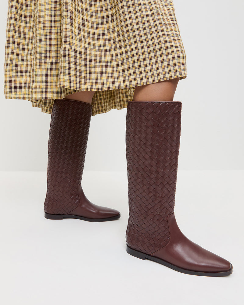 Tilly Espresso Woven Leather Boot in brown espresso woven leather and Gillian Puff Sleeve Dress in brown plaid.