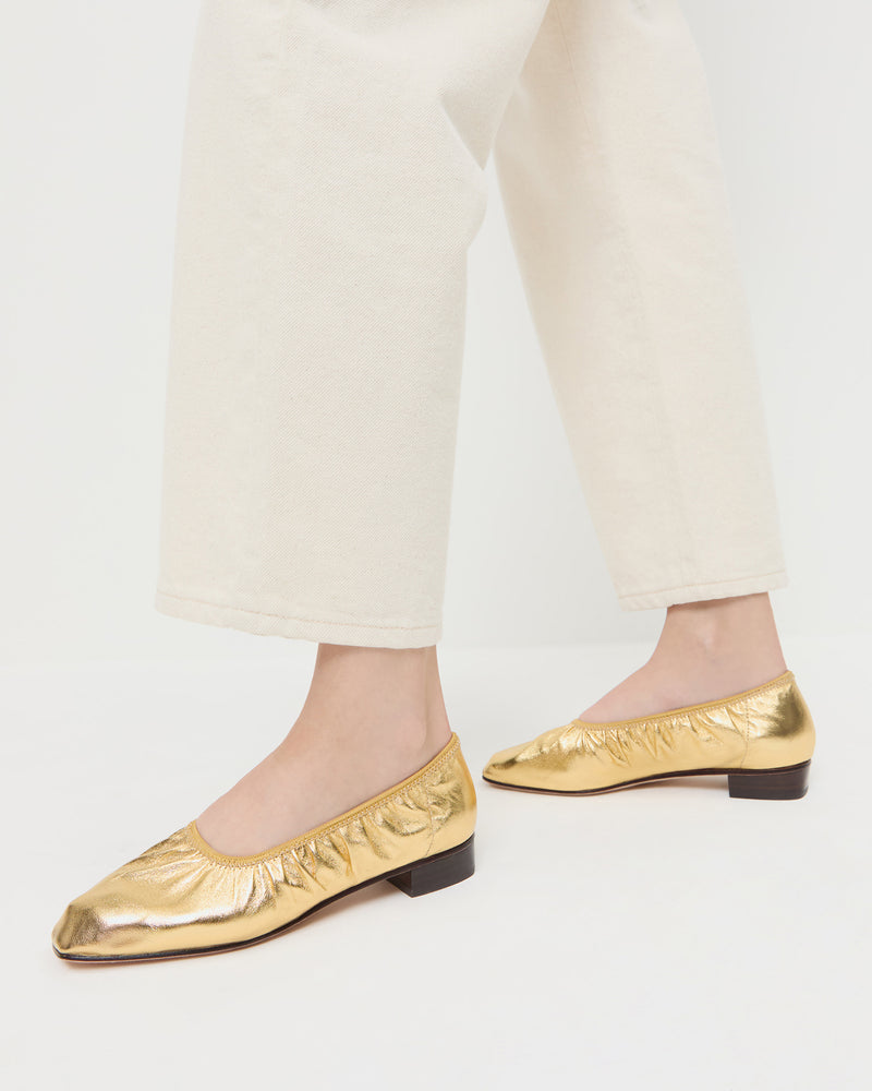 Tove Gold Leather Ballet Pump in gold leather and Winona Denim Pant in natural denim.