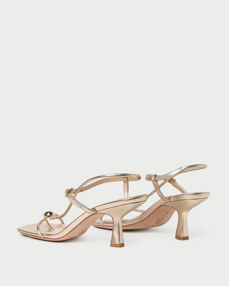 Triana Champagne Leather Mid-Heel Sandal in champagne leather.