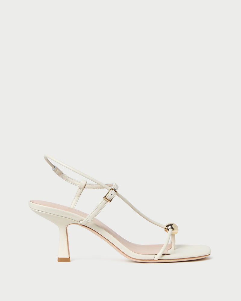 Triana White/Champagne Mid-Heel Sandal in white leather.