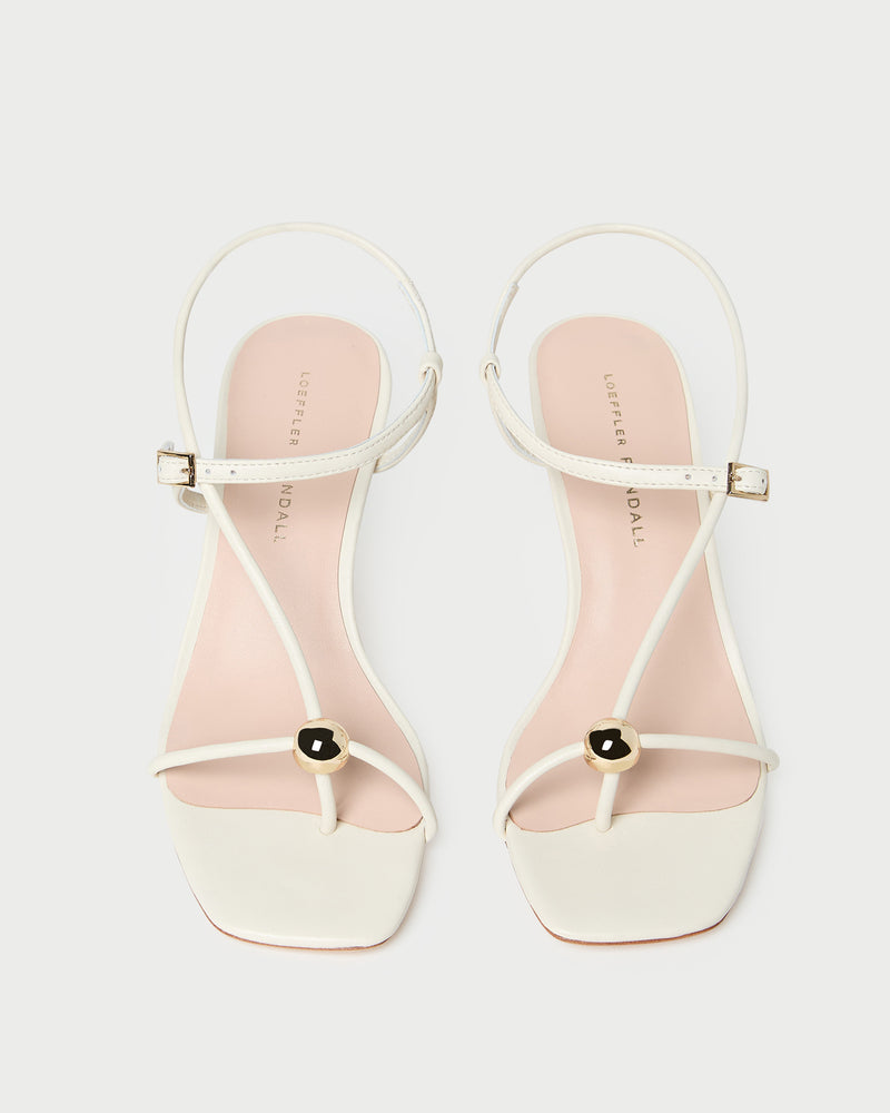 Triana White/Champagne Mid-Heel Sandal in white leather.