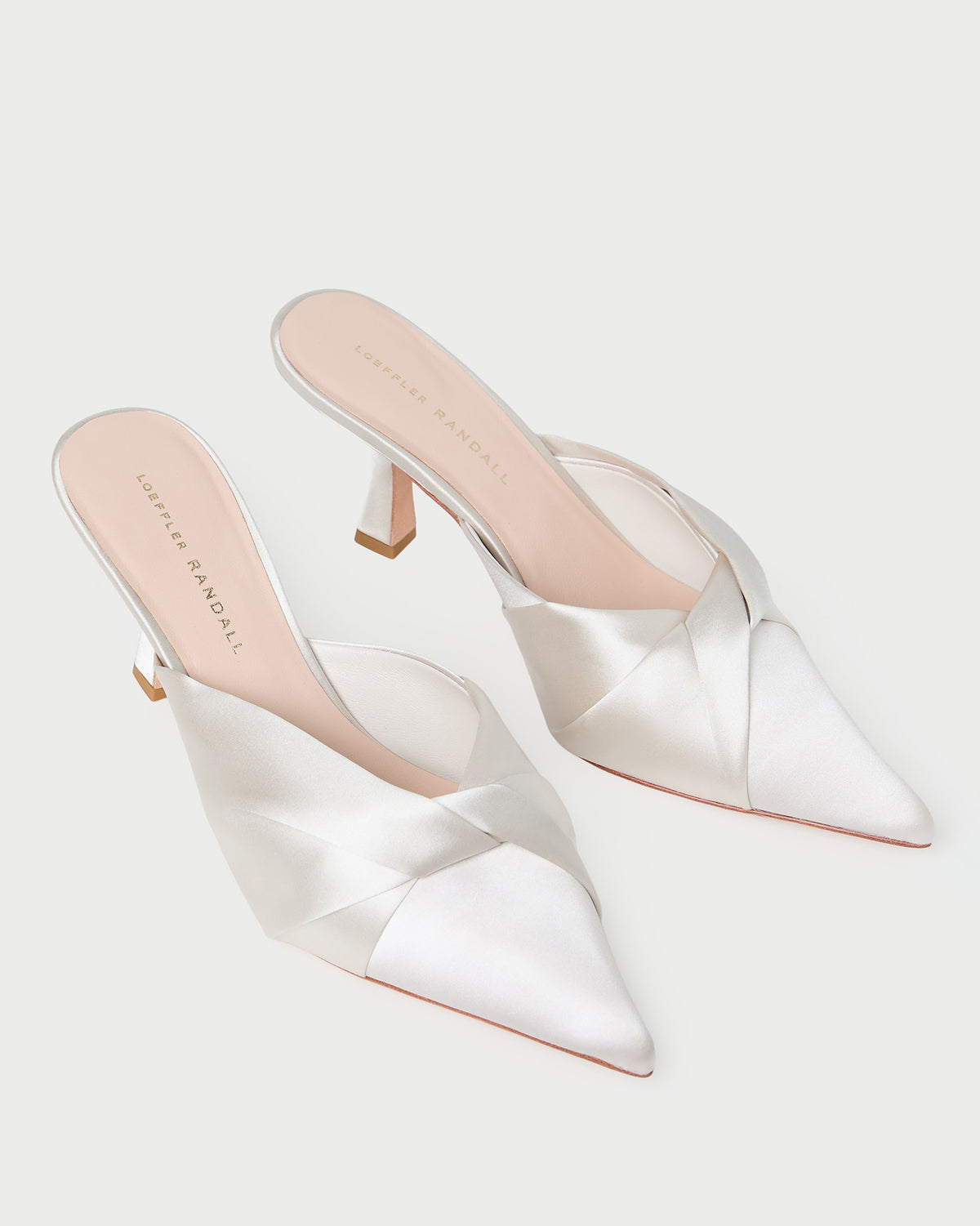 Tyla Cream Satin Twisted Mule in cream satin.