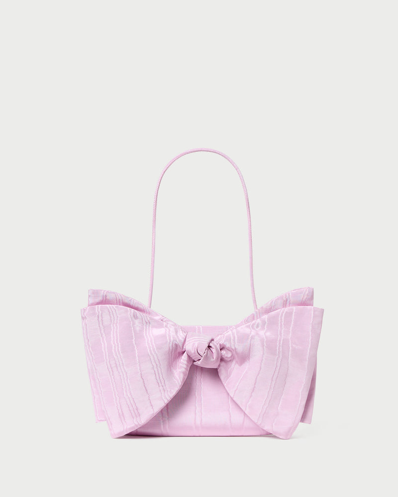 Valerie Pink Moiré Bow Clutch in powder pink.