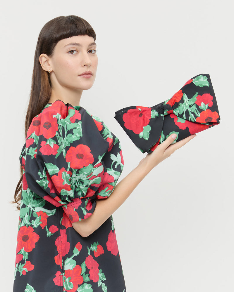 Valerie Black Floral Bow Bag in black floral taffeta and Willy Mini Dress in black floral faille fabric.