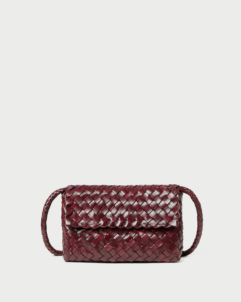 Vinnie Maroon Woven Leather Crossbody in maroon woven leather.