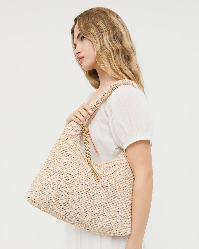 Willow Natural Woven Hobo Bag in woven straw.