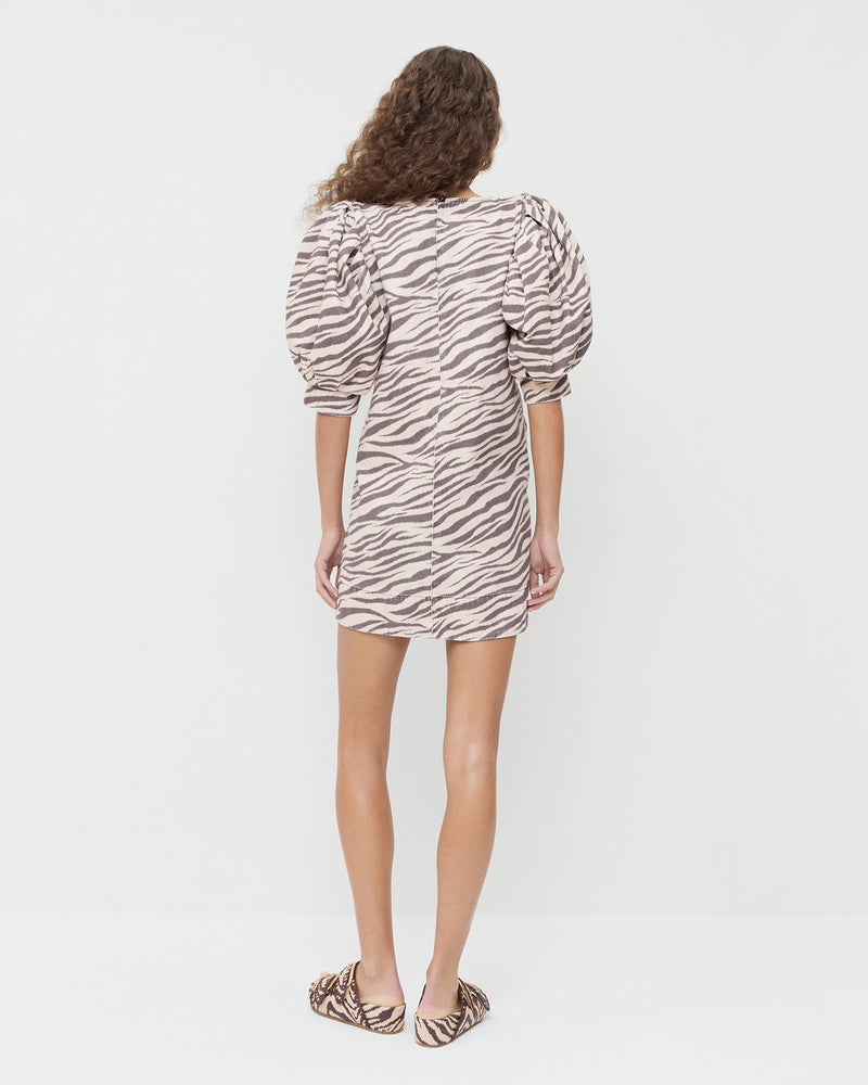 Willy Mini Dress in zebra print denim and Nico Zebra Two-Band Sandal. 