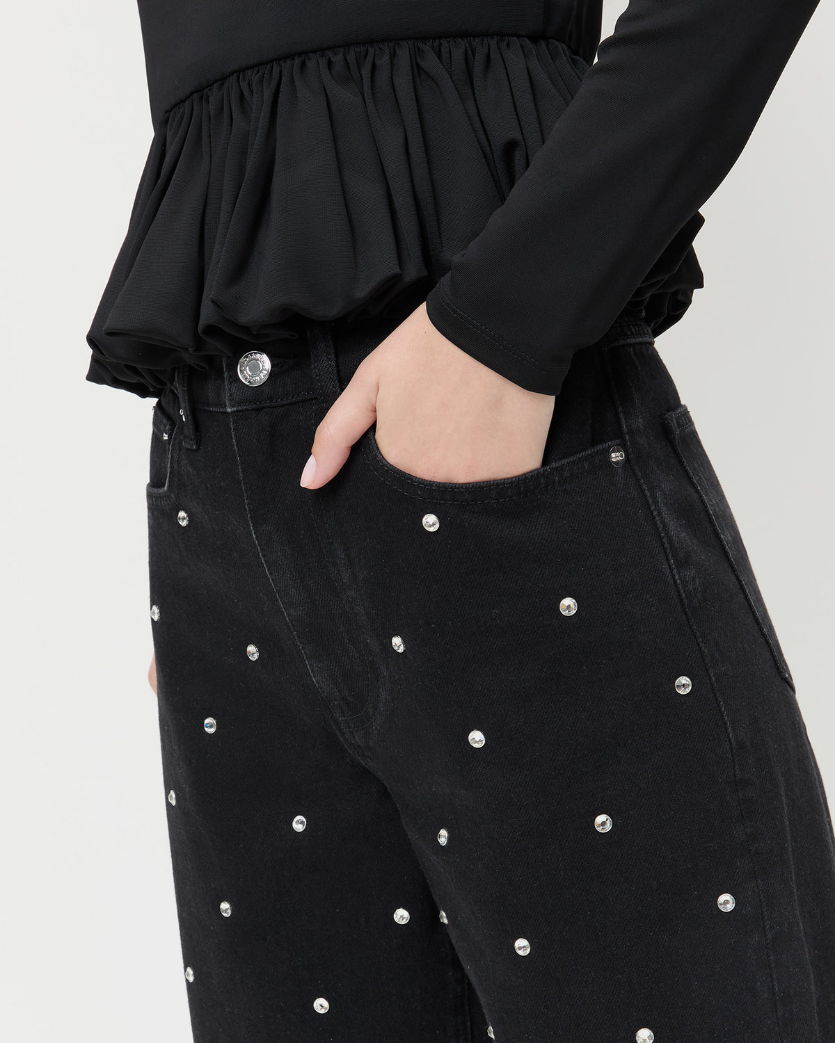 Winona Denim Pant in black denim with crystal accents all over and Posie Peplum Top in black jersey.