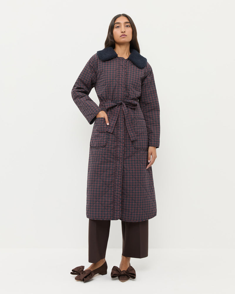 Wyatt Quilted Coat in brown and navy gingham nylon.