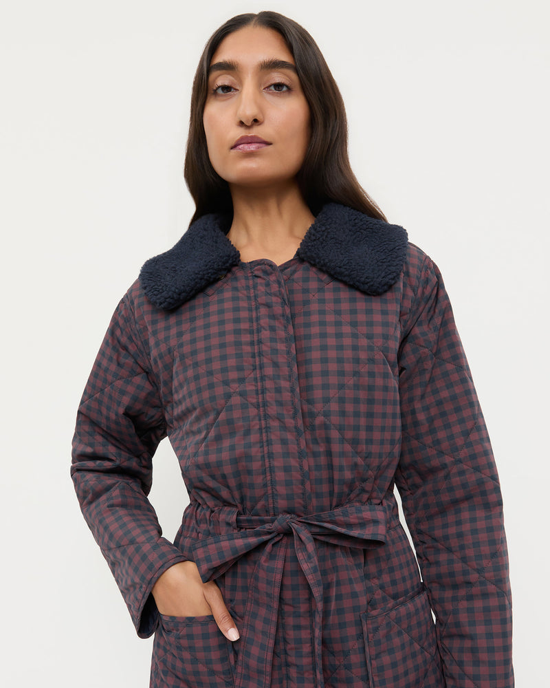 Wyatt Quilted Coat in brown and navy gingham nylon.