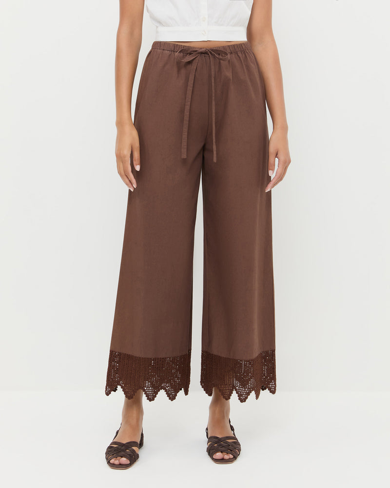 Amani Pant in dark brown cotton and Shelly Brown Suede Flat Sandal.
