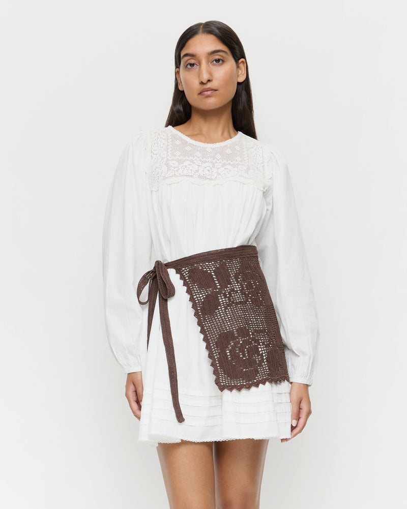 Betty Brown Crochet Apron and Brenna Dress in white cotton.