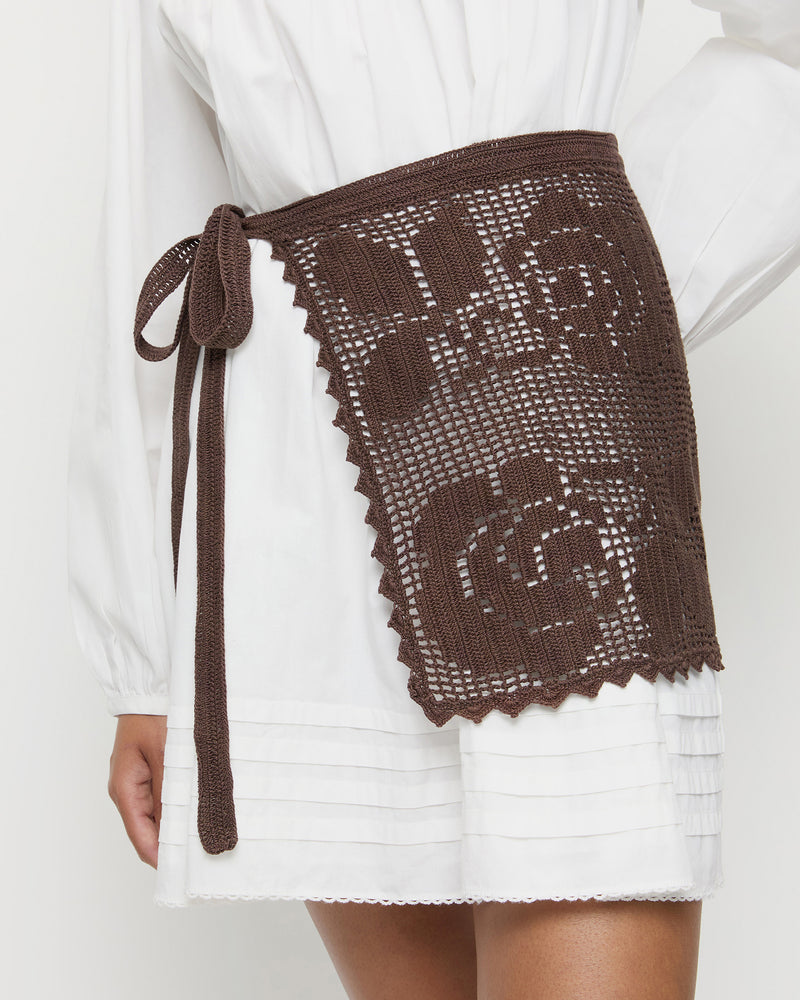 Betty Brown Crochet Apron and Brenna Dress in white cotton.