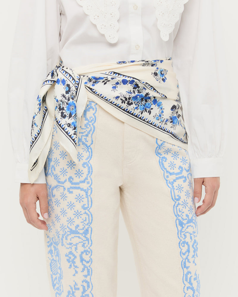 Beverly Cream/Blue Silk Scarf, Ken Top in white cotton, and Molly Workwear Pant in natural cotton with blue embroidery.