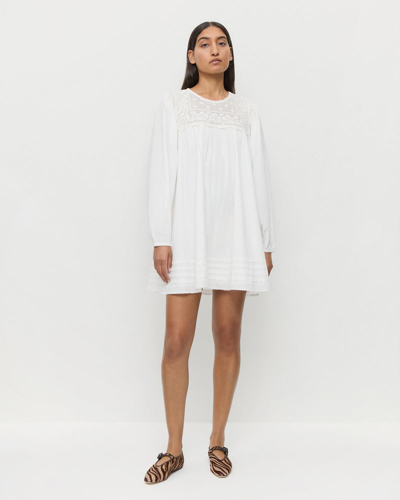 Brenna Dress in white cotton and Junia Zebra Mary Jane.