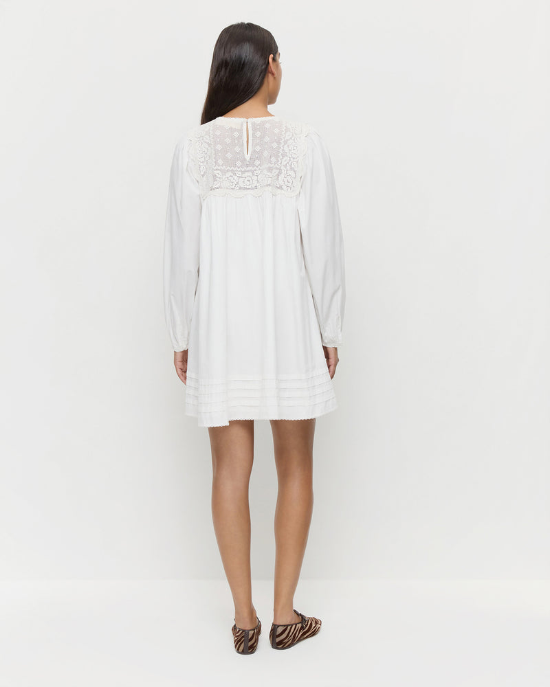 Brenna Dress in white cotton and Junia Zebra Mary Jane.